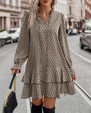 All-Over Print V Neck Dress with Tie Neck, Flare Sleeve and Layered Ruffled Hem