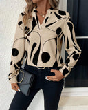 Graphic Print Notched Neck Long Sleeve Blouse