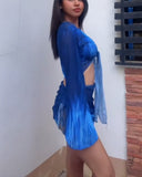 A three-piece swimsuit set consisting of crisscross strap Cover-Ups, a bikini and a drawstring swim skirt.
