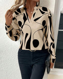 Graphic Print Notched Neck Long Sleeve Blouse